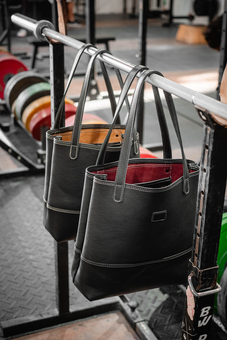 Onyx Tote Bag full grain black pebbled leather lined with suede. 